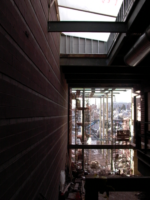 New PAC-PE buildings- Auditorium-top of stairs to Auditorium view to west thru entry- this view should exist through glass at entry