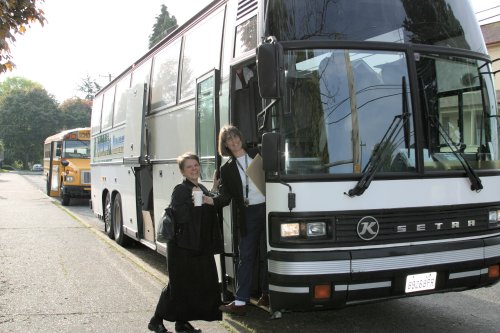 Setting off on the bus to visit four schools